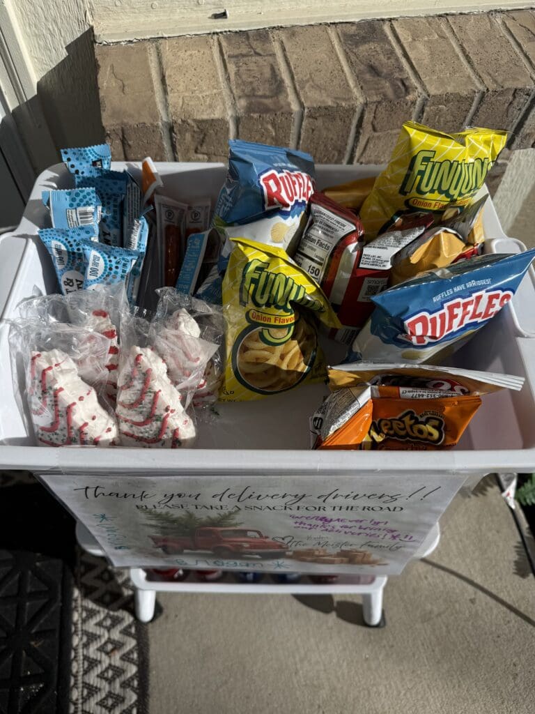 rolling cart containing drinks and snacks